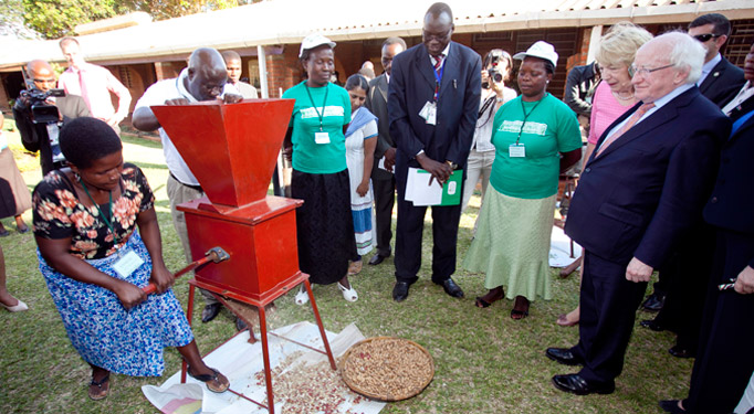 Pictured is President Michael D Higgins and his wife Sabina during a visit to the International Crops Reserch Institute for Semi-Arid Tropics (ICRISAT) viewing a groundnut shelling machine in Malawi Photo Chris Bellew /Photography 2014